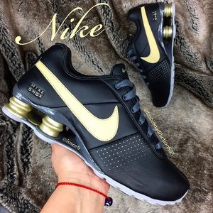 gold nike shox womens